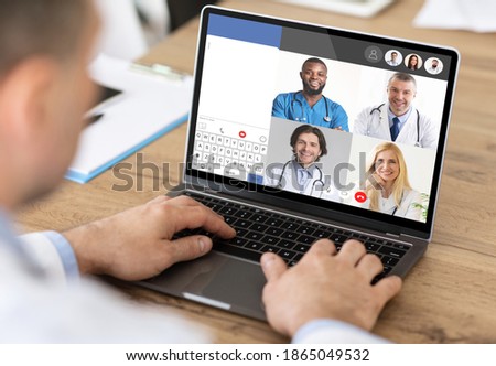 Doctor Having Online Video Call With Colleagues Sitting At Laptop In Office. Online Clinic Consultation, Distance Medical Conference Concept. Selective Focus, Cropped, Collage