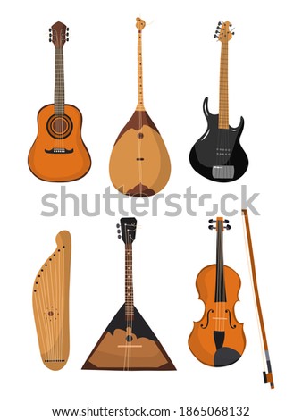 Set of stringed musical instruments. Collection of balalaika, gusli, violin, gitar, dombra