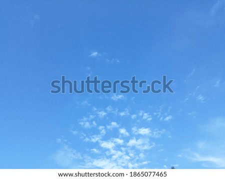 The thin clouds in the blue sky are interesting,  the sky is full of clouds, during the day, it looks bright, the wind forms like white cotton, beautiful above the sky, sun white, storm, sun, sunlight