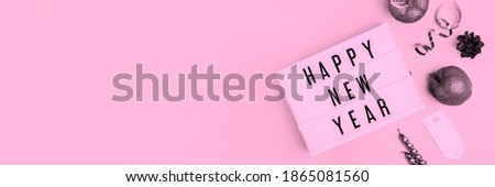 Happy New Year Text Light Box. Panorama Banner. Goodbye 2020 Concept Wide Angle Image On Pink Background. Abstract Celebration Concept With Copy Space For Message.