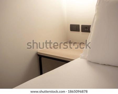 white pillows decoration on bed in bedroom interior