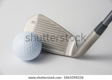 golf club and ball on white  background