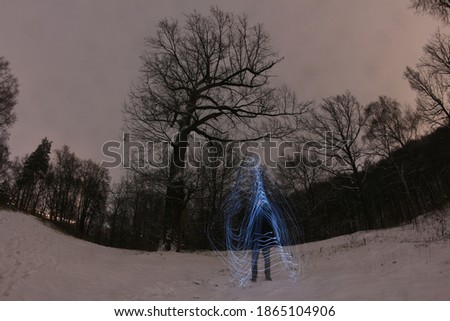 Freezelight photo at night in winter , teleportation