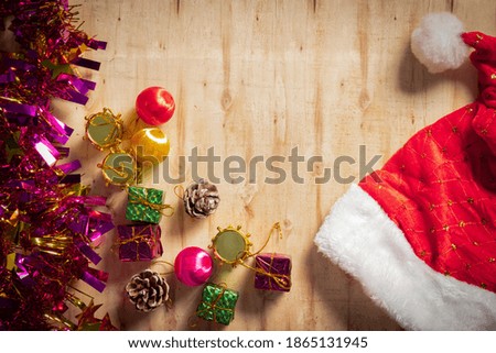 Christmas background with decorations and gift boxes on old wooden background,copy space