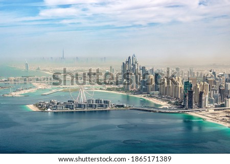 Aerial view of Dubai Marina skyline with Dubai Eye ferris wheel, United Arab Emirates Royalty-Free Stock Photo #1865171389