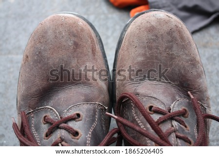 Beautiful close-up shot of the safety boots for metal and construction work. 