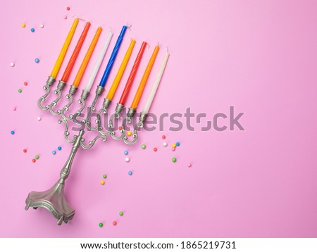 Top view image of jewish holiday Hanukkah background with traditional  menorah (traditional candelabra) and candles.