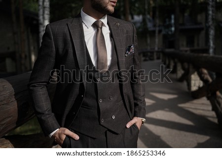 A man wearing a suit and tie Royalty-Free Stock Photo #1865253346