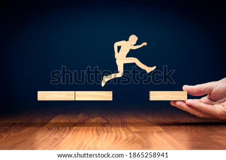 Coach motivate to personal development, success and career growth concept. Businessman do the big jump into the new post-covid era after corona crisis. Royalty-Free Stock Photo #1865258941