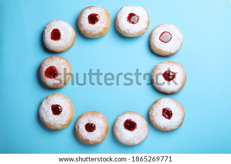 Hanukkah doughnuts with jelly and sugar powder 