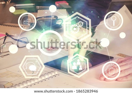 Double exposure of man's hands holding and using a phone and social network theme drawing.
