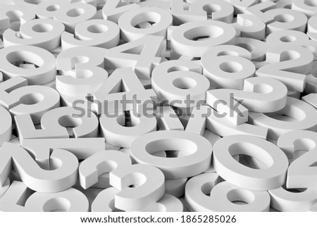 
Background from volumetric white numbers. Black and white image. Royalty-Free Stock Photo #1865285026