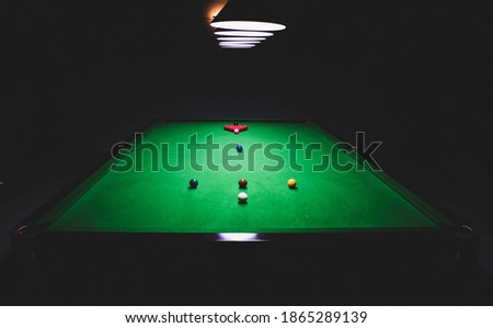Snooker Table In The Billiard Hall Royalty-Free Stock Photo #1865289139