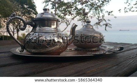 Black tea brewed in a samovar outdoors