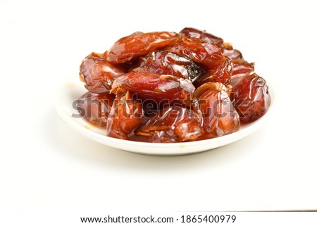 date or date palm, is a flowering plant species in the palm family, Arecaceae, cultivated for its edible sweet fruit.