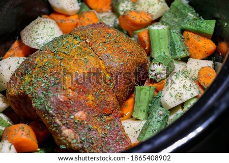crockpot of meat and vegetables