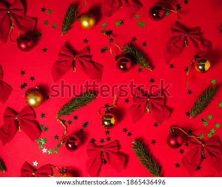 Christmas composition, decorations on red  background, pattern, flat lay, top view