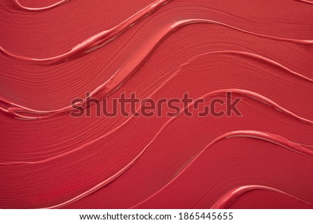 Red lipstick background texture smudged