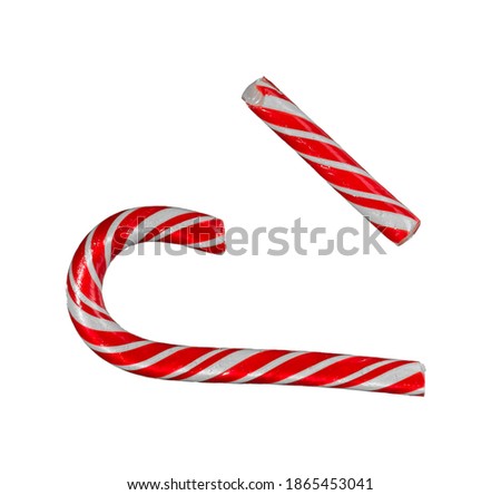 christmas lollipop broken in half isolated on white background