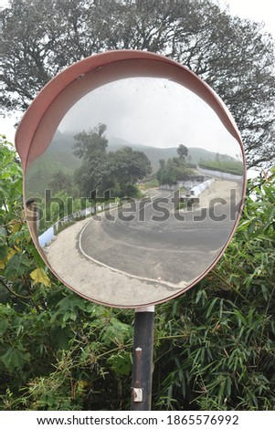 beautiful view rainy mist clouds road way transport curve hairpin bend hill mountain hillstation 