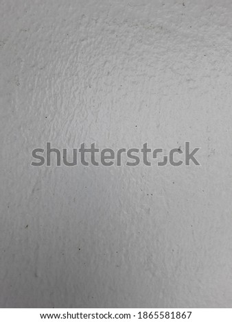 Stained white plaster wall picture