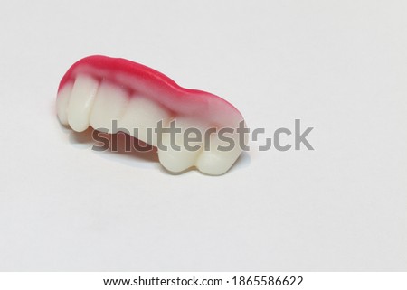 candy teeth on white background