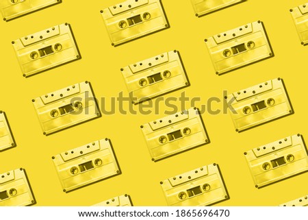 pattern of analogue audio tapes toned trendy color illuminating