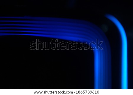 blurry background pic ten, swirly  linear colorful rounded lights pattern  on black 