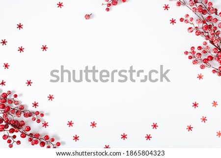 Christmas minimal composition. Xmas decorations, berries on white background. Christmas, New Year, winter concept. Flat lay, top view, copy space
