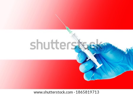 Austria Flag Blurred Background Covid-19, Corona, Selective focused on Syringe Injection