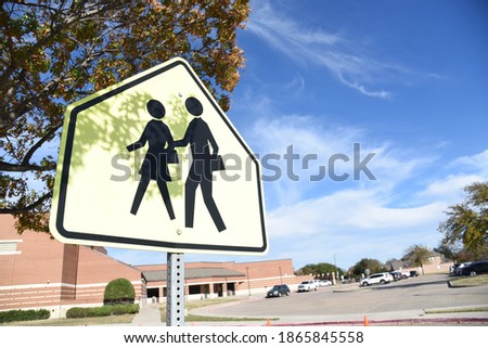 School crossing sign focus with beautiful sky background