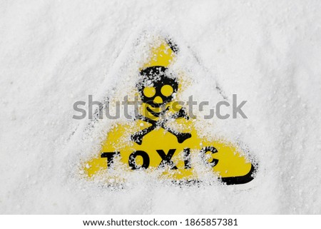 toxicity warning sign in white powder, toxicity sign with white toxic powder, washing powder
