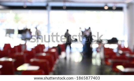 Blurred abstract background of business people in conference or seminar room.