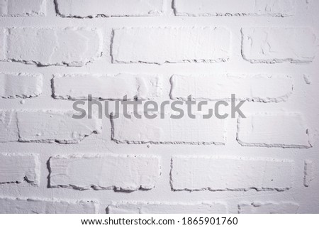 White brick wall, perfect as a background, square photograph close up white brick decorative wall texture