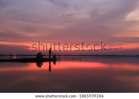 In the evening the fishermen are fishing.Twilight time of Lam Pao Dam Kalasin Province, Thailand