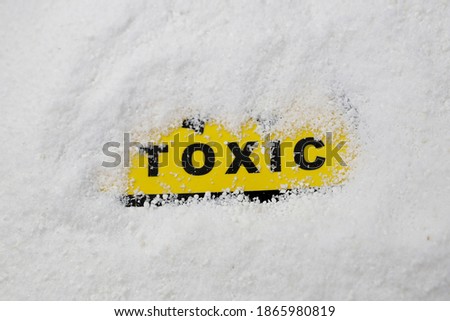 toxicity warning sign in white powder, toxicity sign with white toxic powder, washing powder