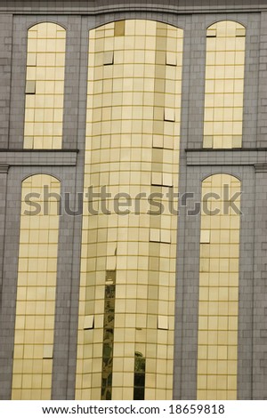 China, Shanghai. City center with modern skyscrapers, office buildings. Closeup photo showing windows, panels, walls, roofs.