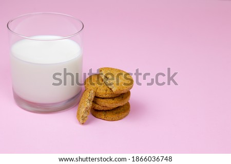 glass with milk and homemade cookie