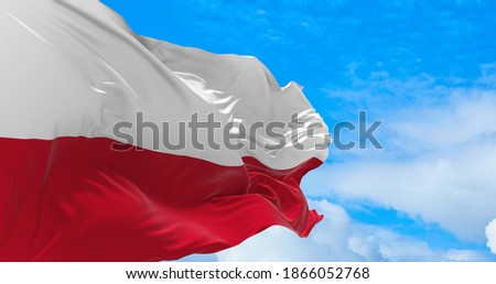 Large poland flag waving in the wind