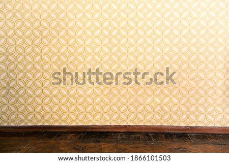 Vintage room, empty retro apartment with old fashioned wallpaper and weathered wooden parquet floor, toned Royalty-Free Stock Photo #1866101503