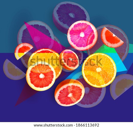 Photo macro set of bright fruits oranges and grapefruit in the section on a blue background. An example for the design or packaging of fruits