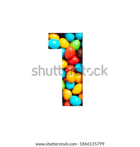 Number one of colourful candies and paper cut in shape of first numeral isolated on white. Typeface for kids design