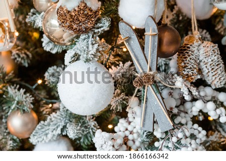 Banner. Modern Christmas decor in beautiful pastel colors. Wooden Toys and a garland on the Christmas tree .
