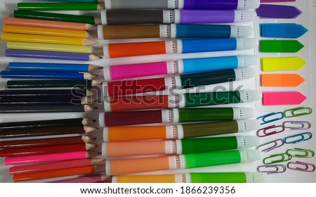 Various colors of stationary on white background.Suitable for background ow wallpaper