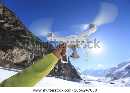 Drone flying in high altitude sky