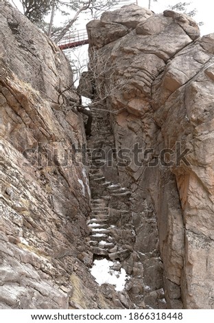 Ftone steps on the rocky cliff near Geumganggul Cave at Seoraksan National Park near Sokcho-si, South Korea