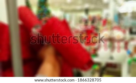 Blurry view of christmas market  store. people ready to searching gift for holiday. religion concept background.
