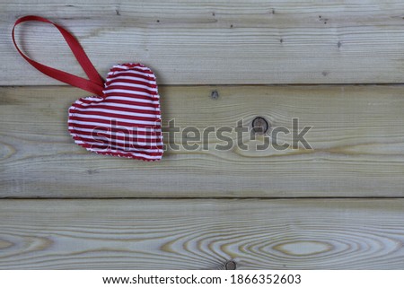 handmade heart on wooden old background. Copy space, top view