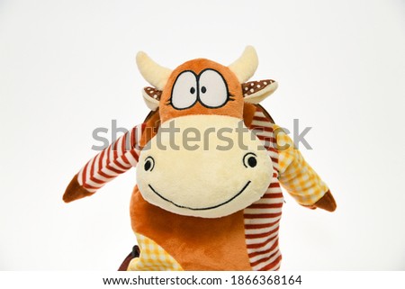 Toy - bull on a white background