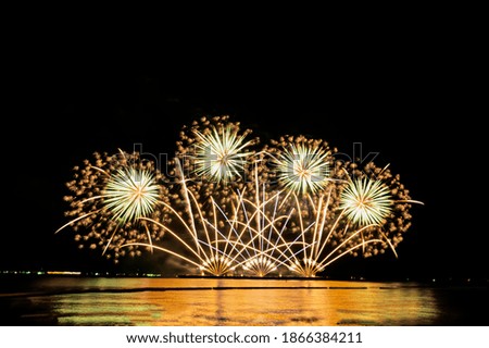 Fireworks and fireworks celebrating black background with copy space